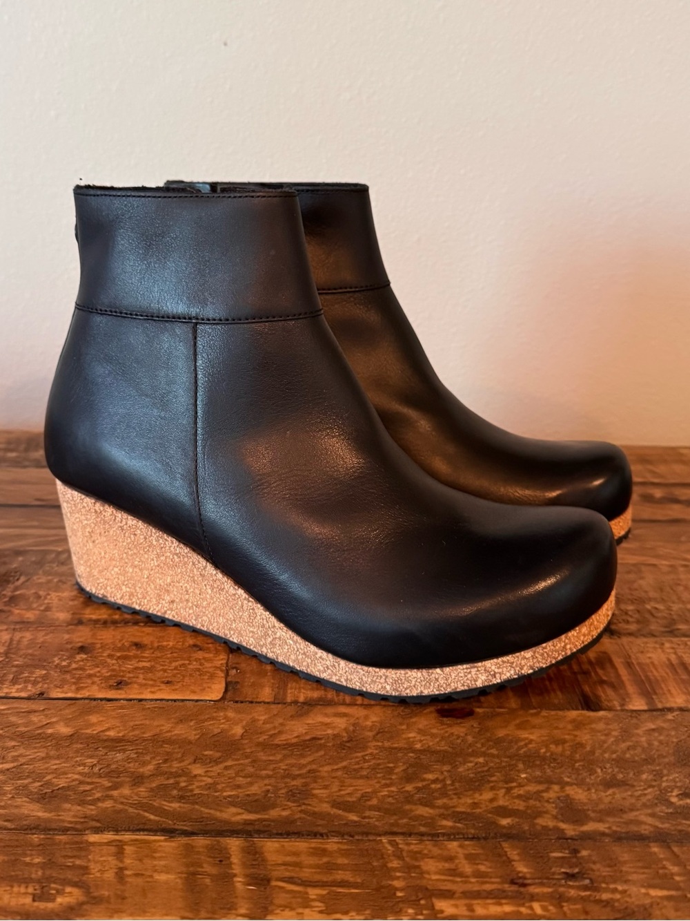 Birkenstock “Ebba” Black Leather Wedge Ankle Boots with Cork-Style Wedge
